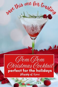 a red and white christmas cocktail on a table