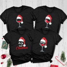 Raise a toast to the holidays with our Santa Hat Red Wine Glass Matching Christmas Shirt, the perfect attire for your festive gatherings. This Christmas Party Tee exudes both merriment and elegance, making it an ideal choice for spreading cheer. For wine enthusiasts, our Custom Christmas Wine Lover Drinking Tshirt adds a delightful touch to your celebrations. Share the joy with your loved one by donning this Christmas Couple Outfit, and let the festivities flow as smoothly as your favorite vintage. You can find other sizes of this shirt in the links below. By clicking on the link, you can go to the blank shirt page and write the design you want in the personalization section when ordering.  Women V-Neck Shirt and Women Tank Sizes: https://etsy.me/3KB9RKo Our products are the Bella+Canvas b Black Christmas Party Tops, Black Christmas Party Top, Black Tops For Christmas Party, Black Party Tops For Christmas, Christmas Party T-shirt With Graphic Print, Holiday Gift Red T-shirt, Holiday Party T-shirt With Crew Neck, Festive Red Holiday T-shirt, Red Festive Holiday T-shirt