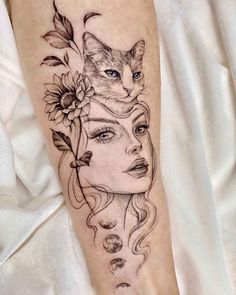 a woman's leg with a cat on top of her head and flowers in the middle