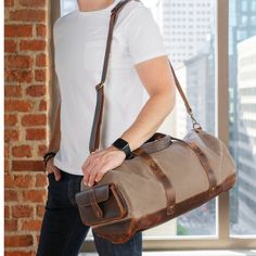 "Londo Canvas Duffel Bag - Vintage Retro Travel Bag Overnight Weekender Bag Carry-On Luggage Bag with Adjustable Shoulder Strap & Interior Pocket - Stylish Gym Bag for Men & Women Get Ready to FINALLY Enjoy Travel the Way You Deserve with our Trusted Duffel Bag! Do you take frequent business trips? Perhaps you are fond of short getaways to nearby destinations? Or you're just the type who wants to pack up to spend the weekend at your partner's or over at your parent's house? Regardless of where you have to or want to be, one thing's for sure: you're here because you need a trusted duffle bag for women/men travel bags to cover all your traveling needs! And, you're very lucky, because you've landed on the page of a duffel travel tote that's beloved for its premium quality, impeccable craftsma Gym Bag For Men, Canvas Duffel Bag, Mens Gym Bag, Canvas Travel Bag, Leather Duffel Bag, Event Horizon, Leather Weekender Bag, Leather Weekender, Leather Duffel