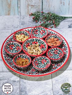 a platter filled with lots of different kinds of food on top of a table