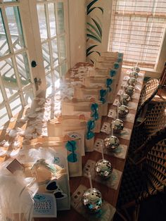 the table is covered with boxes and other items that are sitting on top of each other