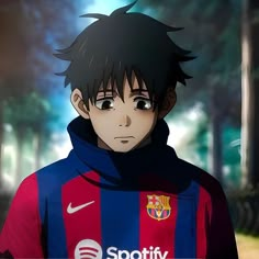 a young man in a red and blue soccer uniform with the word spotify on it