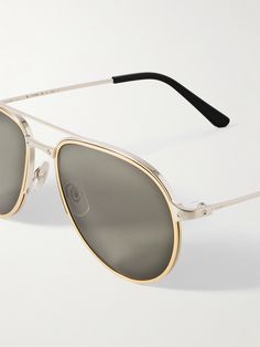 Cartier Eyewear's sunglasses are designed with the same exquisite workmanship as the label's prized timepieces. Made in France from gold and silver-tone metal, this aviator-style 'Santos Evolution' pair features a sleek brow bar, dark-grey lenses and iconic 'screw' details. District Vision, Cartier Santos, Brow Bar, Aviator Style, Cycling Accessories, Sunglasses For Men, Gold Sunglasses, Grey Lenses, Mr Porter