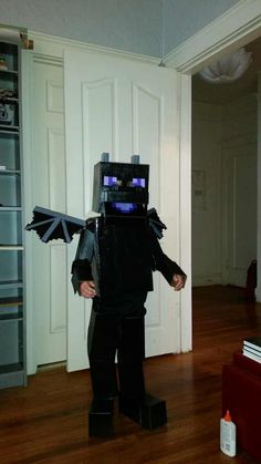 a person in a costume standing on a hard wood floor