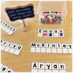 a wooden table topped with lots of different types of letters and words on it's sides