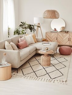 a living room filled with furniture and decor