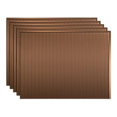 four brown corrugated sheets are stacked on top of each other