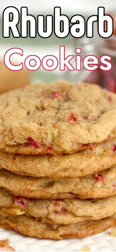 a stack of rhubarb cookies sitting on top of a white and pink plate