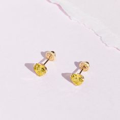 This sweet pair of simulated birthstone small screw back earrings for girls are crafted entirely of 14k yellow gold and adorned with a stunning cubic zirconia heart stone in a three prong setting. Equipped with screw backs they will stay safely in place and your little girl will be super comfortable wearing them all day and night. A meaningful fine jewelry gift for a loved one, packaged into their own little gift box for your convenience. Earrings For Girls, Heart Stone, Stone Heart, Girls Earrings, Fine Jewelry Gift, Screw Back Earrings, Little Gifts, Baby Shop, Prong Setting