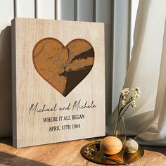 a wooden block with a heart cut out on it