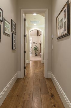 the hallway is clean and ready to be used as an entrance way for guests or family members