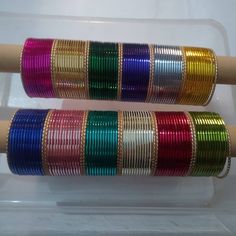 168 Metal bangles set. A set has  12 colours bangles.meganta, light yellow, yellow, gray,green, indigo, blue, pink, teal, cream,red, parrot green colours bangles in one set. Size 2.4 2.6 2.8 2.10 2.12 Metal Bangles, Traditional Bangles, Diy Fairy Wings, Beginner Henna Designs, Best Mehndi Designs, Fancy Jewelry Necklace