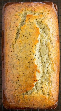 a loaf of bread sitting on top of a cooling rack