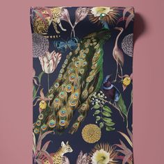 a wall hanging with an image of a peacock and other birds on it's side