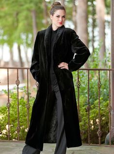 Rich, plush sheared mink, this coat is subtle styling to perfection! Paired with slacks or jeans you'll enjoy its versatile use! It has a dramatic shawl collar and neat bracelet cuffs to finish off this classic design! *This item is custom-made to order. Please allow approximately 2-6 weeks for delivery. For questions or rush orders, please use our chat or call (334) 277-7610. Shown in Black Length: 52 inches Fur Origin- Denmark/China Don't see your size or color? Please call to see if we can custom make it for you! SKU#: 179582 Dye added Elegant Long Mink Outerwear, Chic Mink-colored Formal Outerwear, Chic Mink Formal Outerwear, Chic Mink Outerwear For Formal Occasions, Luxury Velvet Outerwear For Fall, Elegant Long Fitted Fur Coat, Elegant Velvet Winter Outerwear, Elegant Velvet Outerwear For Winter, Elegant Fitted Long Fur Coat