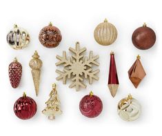 an assortment of christmas ornaments arranged on a white background