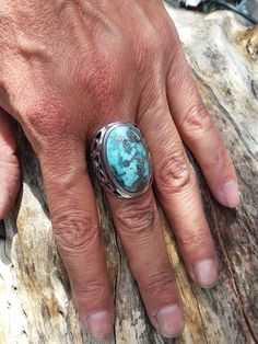 WANTED all over the Universe. Turquoise is recognized Sought After by early KINGS, MOVERS, and SHAKERS! Turquoise is said to be a vessel Imbued with energies associated with Heaven! All My Turquoise is Carefully chosen from around the World. I love the Raw Authentic look and feel of the stone...so I do not over polish the Turquoise! True Bohemian Style...an Original work of Art that you can treasure for a lifetime! Each of My Creations are One of A Kind and are Hand wrought to bring out the best Jewelry Western, Chunky Ring, Chunky Rings, American Jewelry, Native American Jewelry, Bohemian Jewelry, Solitaire Ring, Original Work, Unique Rings