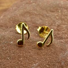 "Music note stud earrings in 18ct Gold Vermeil with butterfly push back closure. A perfect gift for the musician in your life, or to show your love of music. * Sold as a PAIR * A high quality, unique product * Pair Weight 0.8gr * Gift boxed * Ships direct from Edinburgh, Scotland * Supports a small artisan business \"Love music, Love Life!\"" Cute Earring Studs, Music Student Gifts, Music Earrings, Love Of Music, Music Jewelry, Musician Gifts, Ear Stack, Gold Ring Designs, Spring Jewelry