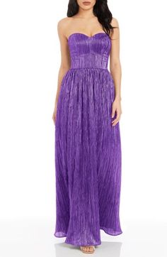 This shoulder-baring plissé gown is designed in a deep emerald hue with a sweetheart neck. 48" center front length (size Medium) Strapless Partially lined 100% polyester Hand wash, dry flat Imported Strapless Purple Maxi Dress For Party, Purple Strapless Formal Gown, Strapless Purple Gala Dresses, Strapless Purple Bridesmaid Dress, Blush Evening Gown, Luxury Purple Strapless Gown, Lavender Maxi Dress, Midnight Blue Dress, Pleated Gown