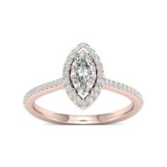 a rose gold engagement ring with a pear shaped diamond in the center and pave set shoulders