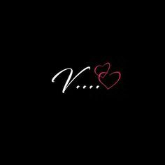 the word love is written in white chalk on a black background with red and pink hearts