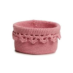 a pink crocheted basket on a white background