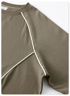 an image of a shirt with zippers on it