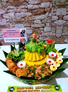 a cake made to look like a fruit and vegetable dish