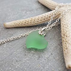 "Aloha! These design shows my love for this beautiful island of Hawaii. This item will be made to order and shipped directly from Hawaii. This is a sea glass pendant with a tarnish resistance silver plated chain necklace.The chain is a 20 inches long (can be customized from 30 inch down to any length if you leave me a note with the order for the preferred length) with a lobster claw catch. This handmade in Hawaii jewelry gift is from cultured sea glass that are specially formed into its shape fo Personalized Green Jewelry For Beach, Personalized Green Jewelry For The Beach, Green Heart Beads Jewelry For Beach, Beach Green Jewelry With Heart Beads, Heart Charm Beach Jewelry, Green Ocean-inspired Nickel-free Jewelry, Green Sea Glass Necklaces For Jewelry Making, Ocean-inspired Recycled Glass Jewelry As Gift, Green Ocean-inspired Sterling Silver Jewelry