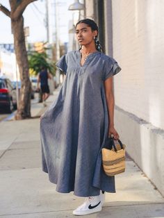 Your new favorite maxi dress. Cut in a light weight chambray on a bias and featuring a maxi fit, side seam pockets, front placket, and ruffle sleeves this dress is bound to be your go-to dress every season. 100% cotton Bra friendly Save energy: cold water wash and air dry (or tumble dry) Made in Los Angeles Cotton Bra, Cotton Bras, Ruffle Sleeve Dress, Ruffle Sleeves, Air Dry, Chambray, Save Energy, Sleeve Dress, Blue Dresses