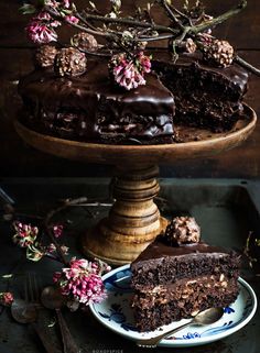 a piece of chocolate cake sitting on top of a plate