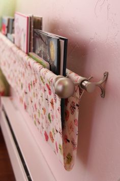 there are many books on the shelf in this child's bookcase, and it is easy to put them together