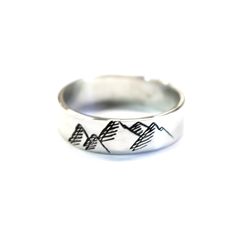 Sterling Mountain Range Ring, Mountain Range Band, Womens Band, Silver Band, Graduation, Woodland Ring, Mountain Ring, Forest Ring, Gift Im so excited to share this NEW LittleGreenRoom Mountain Range Ring! A great gift for a traveler, adventurer, or a nature lover too! This handcrafted ring is a *CUSTOM RING ORDER* There is a processing time for this ring to be created before it is ready to ship. Please see my shop announcement for updated processing times that are subject to change during holid Unique Hand Stamped Ring As Gift, Unique Hand Stamped Rings As A Gift, Unique Hand Stamped Rings As Gift, Unique Stamped Rings As Gift, Unique Stamped Rings For Gifts, Artistic Metal Ring Jewelry For Gifts, Artistic Adjustable Rings For Anniversary, Handmade Artistic Promise Ring, Artistic Handmade Promise Ring