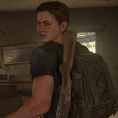 the last of us character walking through a room with a backpack on his back and an arm out