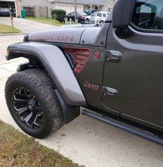 the jeep is parked on the side of the road