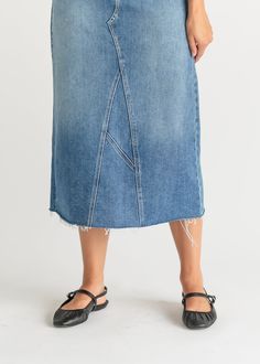 Let us introduce you to the denim skirt you'll want to wear with everything, the Lee A-Line Raw Hem Midi Skirt! This stunning midi denim skirt is an Inherit Design made in the USA! Crafted from high quality, stretchy, medium wash denim that is super soft and will keep you comfortable all day long. The A-line fit is walkable, modest, and on-trend with a raw hem. This sustainable, modest, American-crafted skirt is a true seasonless staple you will wear for years to come! Style | Midi, Denim Color Summer Midi-length Denim Skirt, Denim Blue Midi Length Skirt For Summer, Denim Blue Midi Denim Skirt For Summer, Dark Wash Straight Leg Skirt For Spring, Trendy Midi-length Denim Skirt For Spring, Casual Medium Wash Midi Skirt, Spring Straight Leg Dark Wash Skirt, Trendy Spring Denim Midi Skirt, Casual Midi Length Denim Blue Bottoms