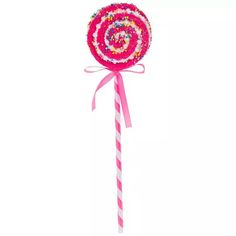 a candy lollipop with sprinkles on it and a pink ribbon