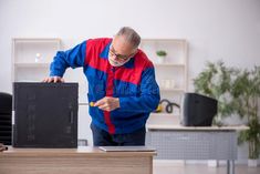 Old male repairman repairing computer stock photo Computer Lab, Stock Images Free, Photo Image, Royalty Free Stock Photos, Stock Images, Repair, Computer, Stock Photos