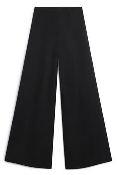 This ultra-wide pant is a statement maker in four-way stretch ponte. Style it with a tucked-in tee for a casual look or dress it up with a blazer for a power suit. ✓ Wrinkle Free ✓ Four-Way Stretch ✓ Day to Night ✓ Pocket DETAILS Luxe ponte knit Elasticated pull-on waistband No-Bulk back pocket FIT Wide leg Regular waist fit True to size Model is 5'8" and wears size S MEASUREMENTS Inseam: 32.5" Front rise: 11.5" (size S) Leg opening circumference: 29" (size S) FABRIC + CARE 67% rayon, 30% nylon, 3% Spandex Dry clean only.