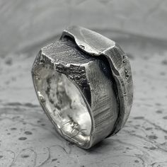 "At the moment we have difficulties with the payment system and we only accept payment through PAYPAL. When placing an order, select PAYPAL as a payment method. Otherwise, we will have to cancel your order. Thank you for understanding! ... UNION Ring Material: 925 Sterling Silver Processing Type: Oxidized Volcanic Sulfur Approximate parameters weight 12-14 gr width 1-1.3 cm DESCRIPTION: The UNION ring is another experiment with simple shapes. These two things are again inextricably linked, turni Modern Oxidized Finish Rings For Anniversary, Modern Oxidized Finish Anniversary Ring, Brutalist Sterling Silver Signet Ring Gift, Brutalist Sterling Silver Ring For Anniversary, Brutalist Silver Rings As A Gift, Brutalist Sterling Silver Rings For Gift, Brutalist Sterling Silver Rings As Gift, Union Rings, Custom Handwriting Jewelry