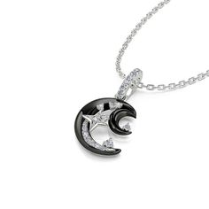 Shimmering with fascinating celestial style, this moon & star necklace draws all the right kinds of attention. Created in sterling silver, it showcases a black crescent moon adorned with glistening white stones, dots of stars, and a smaller silhouette of the moon. The fanciful design is completed with exquisite workmanship and dainty polishing details. This graceful necklace is reminiscent of the beautiful and arcane night sky. Make it a great gift for her on a special day!Carat Weight: 0.211 ct Black Star-shaped Sterling Silver Necklace, Black Moon Charm Round Pendant Jewelry, Black Moon Phase Round Pendant Jewelry, Black Moon Phase Round Pendant Necklace, Black Moon Phase Necklace For Gift, Black Round Pendant Jewelry With Moon Charm, Black Necklace With Moon Charm, Black Round Necklace With Moon Charm, Black Moon-shaped Jewelry For Gift