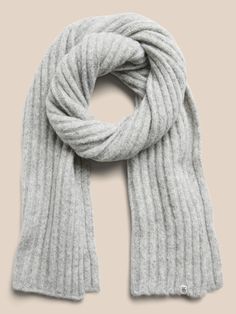 So cozy, this heathered scarf is knitted using one of our softest yarns, spun from a blend of alpaca wool for extra warmth.  Length: 76" (193cm) Width: 12" (30. 5cm) Ribbed Scarf, Grey Scarf, Girls Life, French Girl, Alpaca Wool, Wool Scarf, Soft Yarn, Winter Scarf, Autumn Winter Fashion