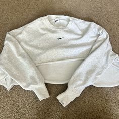 Heather Grey Cropped Nike Sweatshirt! Never Worn :) - Smoke And Pet Free Home! Comfy Crew Neck Top For Streetwear, Nike Cotton Athleisure Sweater, Nike Cotton Tops For Winter, Nike Cotton Sweater For Loungewear, Nike Oversized Long Sleeve Top, Nike Crew Neck Top With Ribbed Cuffs, Nike Long Sleeve Tops With Ribbed Cuffs, Nike Long Sleeve Tops For Loungewear, Comfy Nike Long Sleeve Sweatshirt