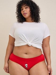 FIT Mid-rise. Full coverage. MATERIALS + CARE Seamless knit fabric. 94% nylon, 5% spandex, 1% cotton. Machine wash cold. Dry flat. Imported. DETAILS Scalloped waistband. . Dancing Santa skeleton graphic. . 'Dead inside not feeling festive' print on back. . The best plus size women's seamless smooth mid-rise hipster panty panties in dancing santa skellies red made of seamless. Torrid is your destination for cozy fall and winter clothes to keep you warm and comfortable. Tight Red Elastane Bottoms, Solid Cotton Bottoms With Seamless Construction, Seamless Cotton Bottoms, Solid Seamless Cotton Bottoms, Red Casual Brief Bottoms, Casual Red Brief Bottoms, Red Seamless Cotton Bottoms, High Stretch Red Seamless Bottoms, Fitted Seamless Red Bottoms