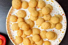 a plate full of fried food on a table