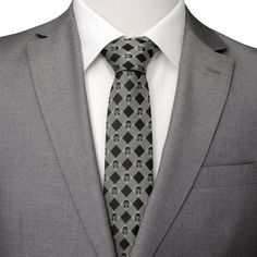 Show that you're willing to do any job for the right price with our Mandalorian Plaid Black Gray Men's Tie, featuring the helmet of the Galaxy's greatest bounty hunter. Set in a plaid pattern of gray and black, this tie gives you the confidence to answer any request with “As You Wish.” Experience the Force with our expertly crafted Silk Blend tie. It's built to withstand the tests of galactic events, infused with Jedi wisdom, and ready to accompany you on interstellar missions. Officially licens Gray Ties For Business, Gray Business Ties, Fitted Plaid Ties, Jedi Wisdom, Mandalorian Design, Bon Prix, Star Wars The Mandalorian, Men's Tie, Bounty Hunter