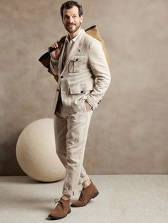 A nod to our heritage, this suit jacket fuses old world style and modern touches, like utilitarian pockets and a unique notch lapel that buttons all the way up.  Reach for it when occasion calls for sumptuous style as the luxurious linen and cotton f Clothes For Men Over 50, Party Jackets, Tuxedo Blazer, Beautiful Suit, Suit Pant, Slim Fit Suits, Mens Fashion Classy, Safari Style, Groom Outfit