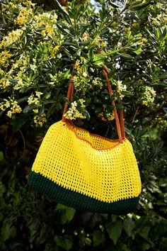 This crotchet handbag is handmade with care and uniquely for you: -Stiffy and durable materials help it maintain its shape and make it roomy.  -It can be carried by hand or on the shoulder.  -A blend of yellow and green injects a vibrant burst of color into the design. -This piece is perfect for everyday uses, grocery trips or beach outings, combining style and functionality. MATERIALS: -Polyester cotton mixed yarn Size:  -Height: 10.5 in -Length: 13.5 in -Width: 5 in -Strap length: 20 in CARE INSTRUCTIONS: -Handwashing with care (recommended) -Do not wash in the washing machine. -Do not use bleach. - Each piece may have imperfections as they are all handmade. Mustard Bag, Yarn Sizes, Yellow And Green, Bag Handmade, Washing Machine, Gift For Her, Care Instructions, Bleach, Im Not Perfect