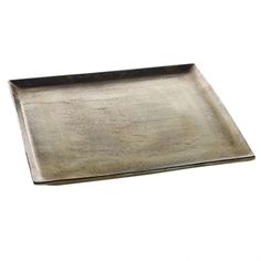 an empty metal tray on a white background